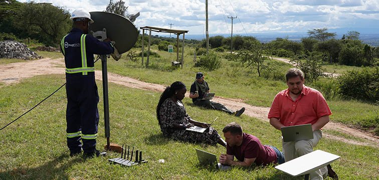 Staff testing equipment at KENET in Nairobi.