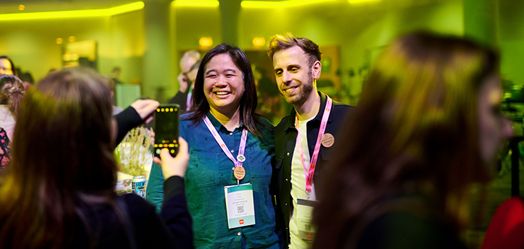 Two community champions having a photo taken.