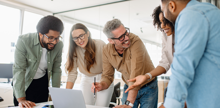 Business professionals actively discussing ideas and strategies during a corporate meeting