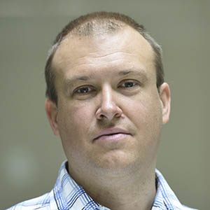 Simon Atack headshot