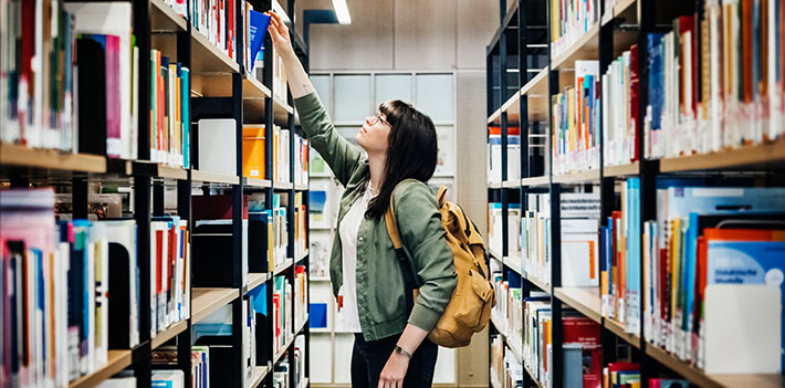 A female student in a library.