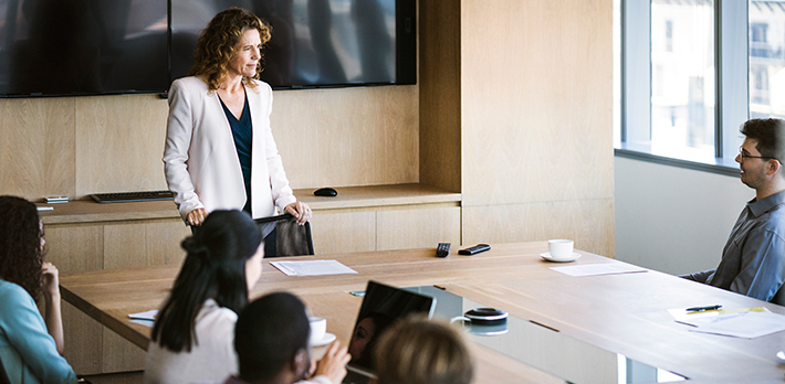 A leadership meeting in a conference room.